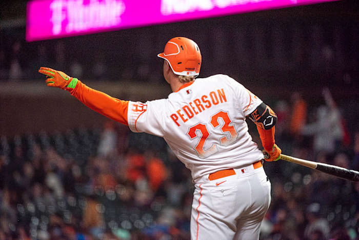 SF Giants outfielder Joc Pederson signalling for a fair ball. (2022)